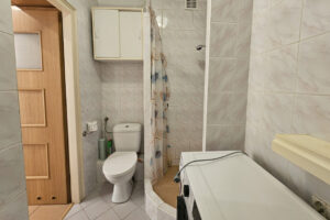 Sunny Studio Apartment with Separate Kitchen & Balcony for Sale in Ursus, Warsaw 5